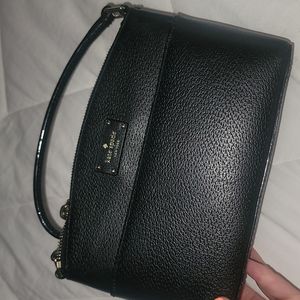 Black Kate spade bag with the crossbody strap